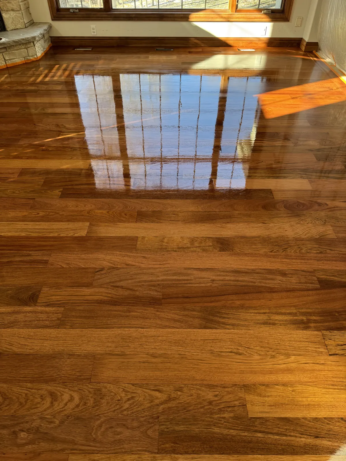 Refinished Brazilian cherry floor with a glossy finish, Brookfield, WI