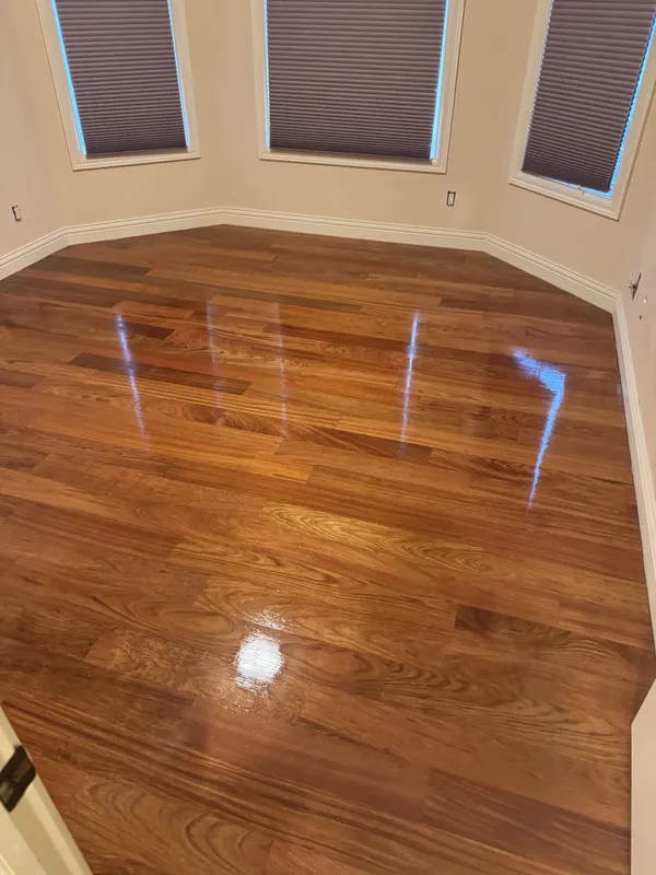 New Brazilian cherry floor in a room with a bay window, Brookfield, WI