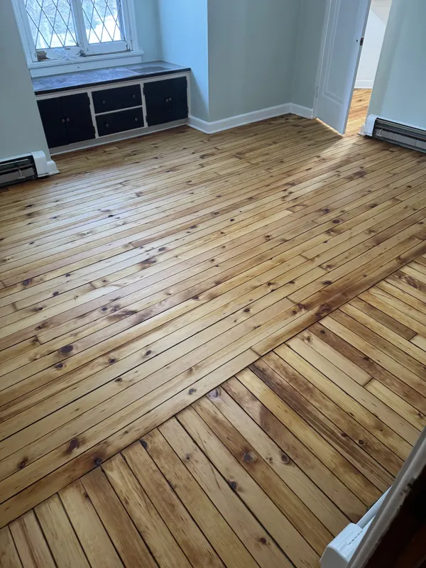 Refinished original plank floor in an early 1900s home, Cudahy, WI
