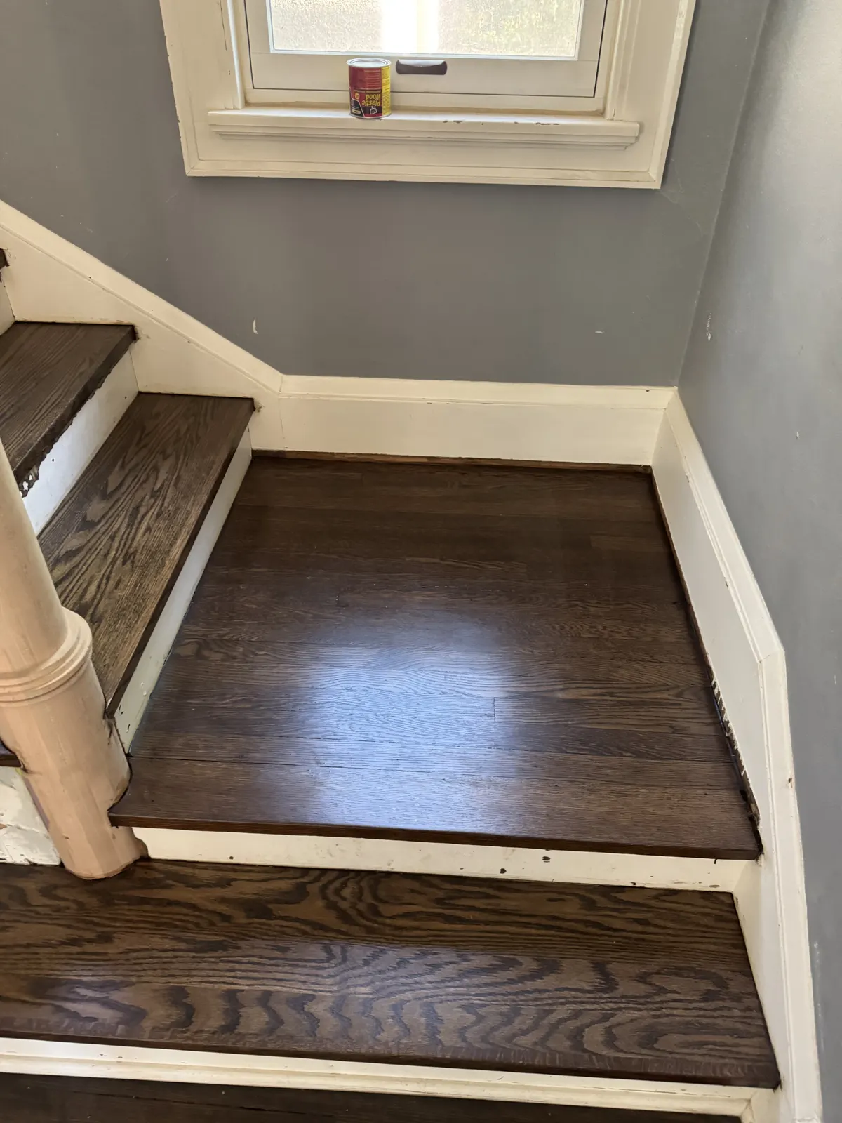 Refinished oak stair treads and landing in an 1800s Fox Point home