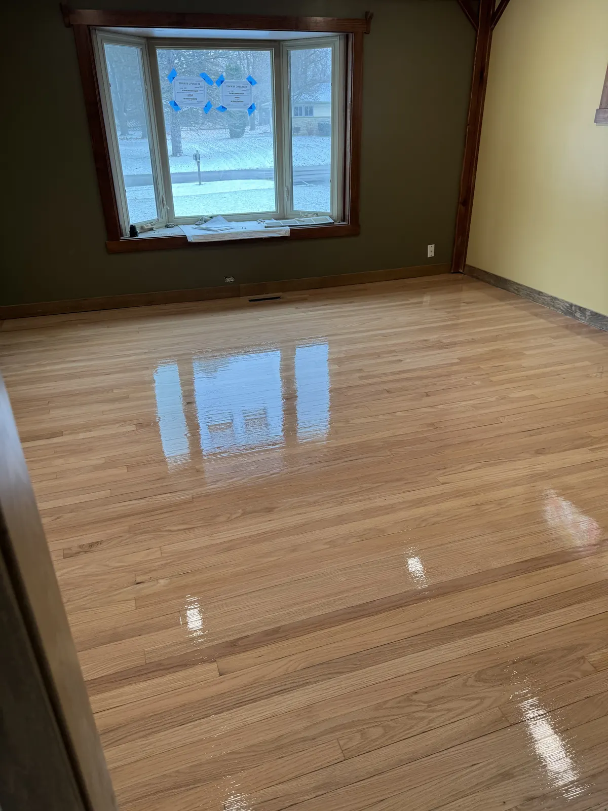 Hardwood floor refinished in a natural tone, Menomonee Falls, WI